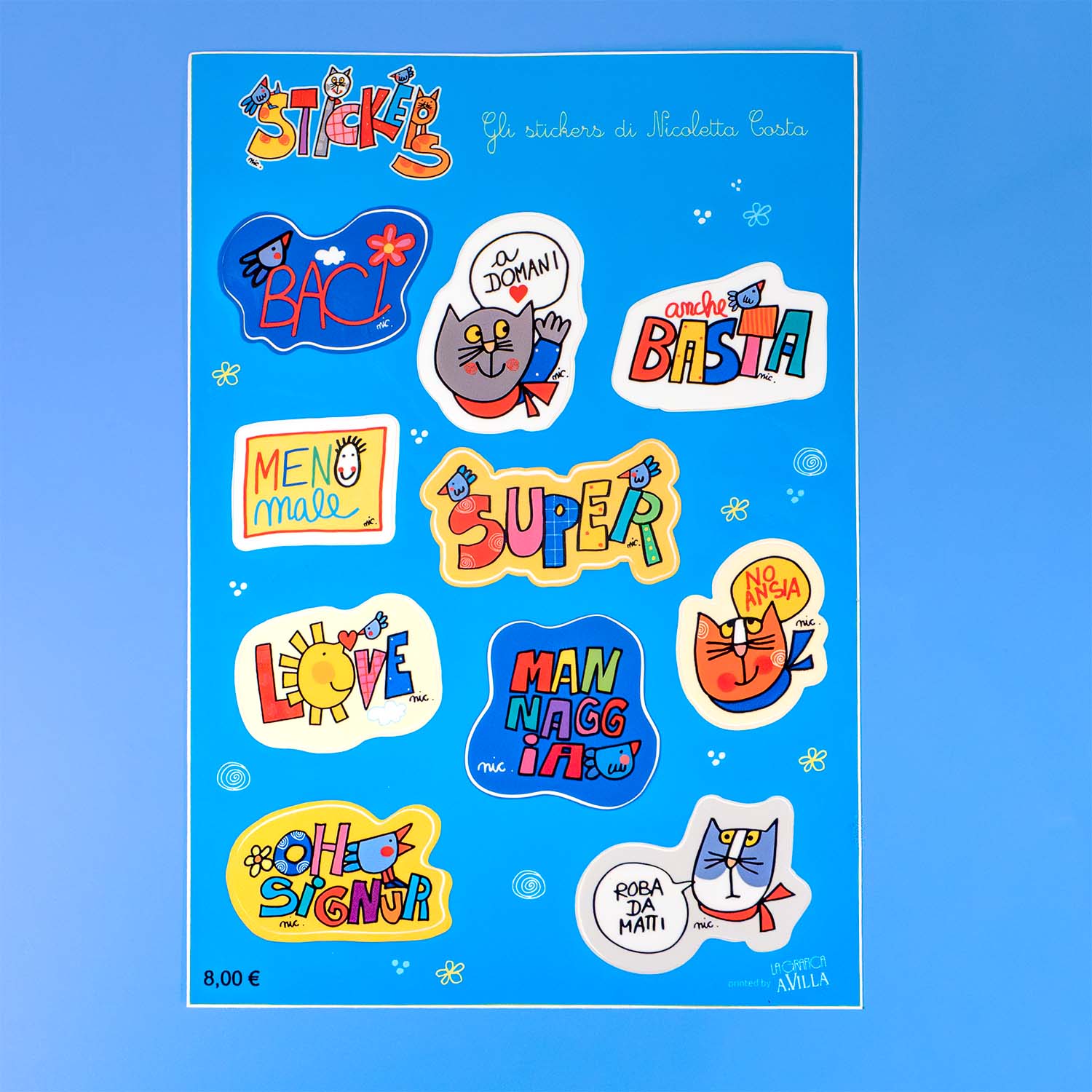 Foglio di sticker illustrati di Nicoletta Costa con personaggi e scritte colorate